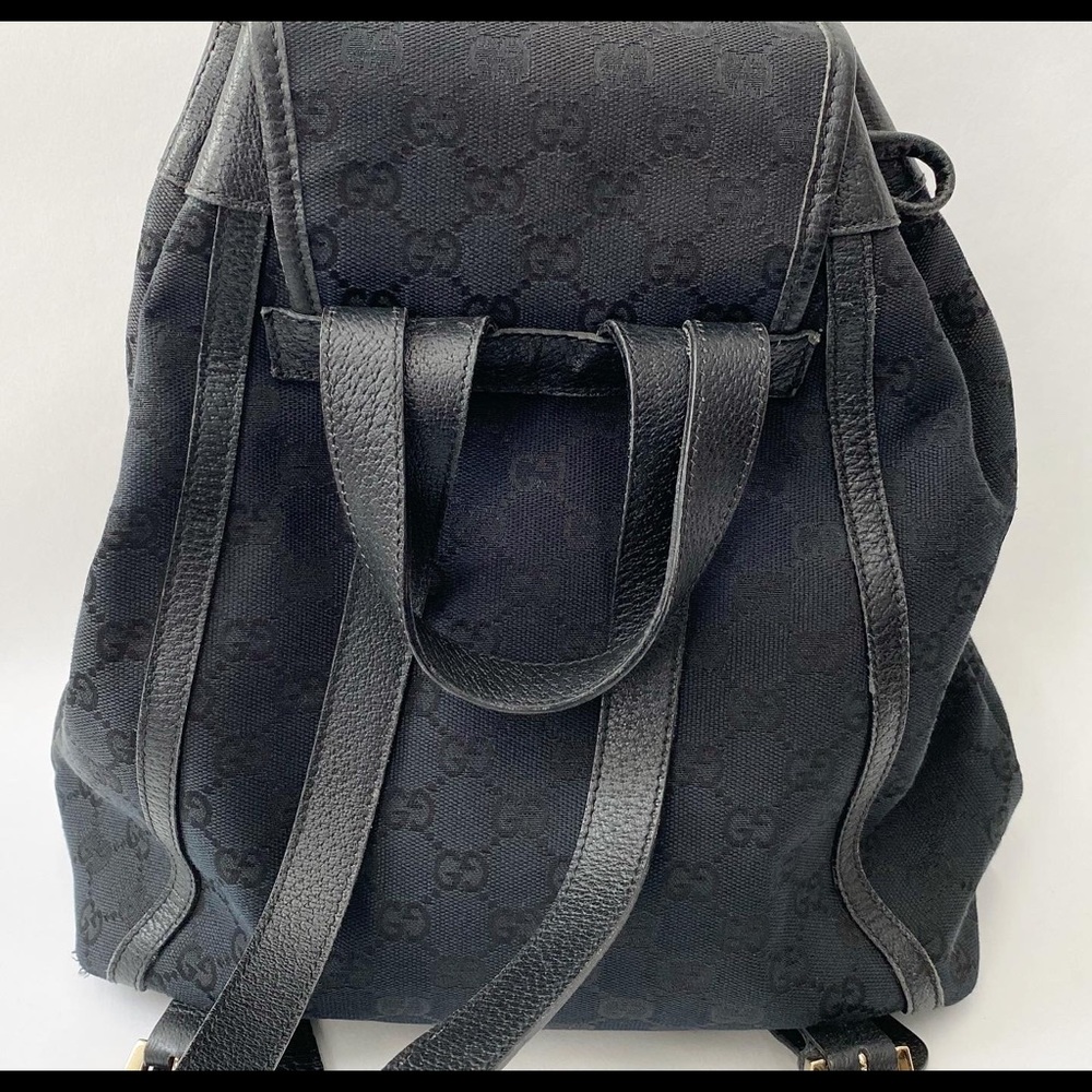Gucci Black GG Canvas Drawstring Backpack with Gold Accent - Picture 3 of 14